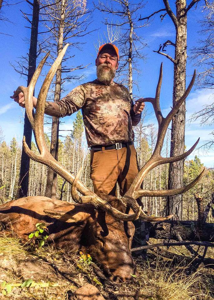 Kyle Lamb with elk on hunting trip