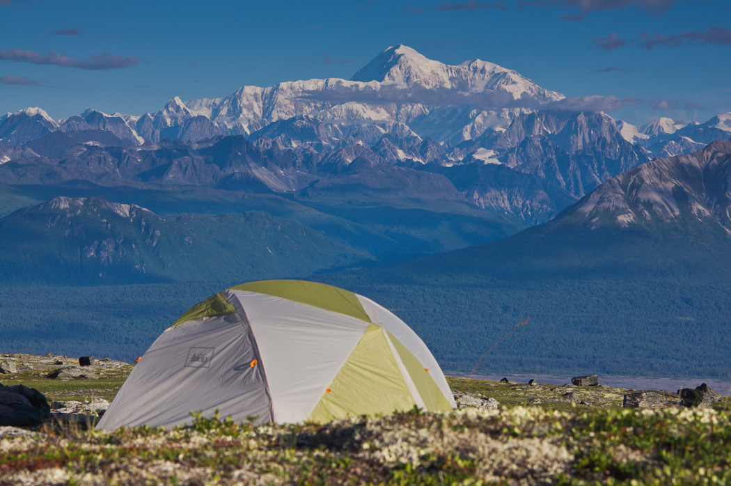 Tent set up with mountains in background