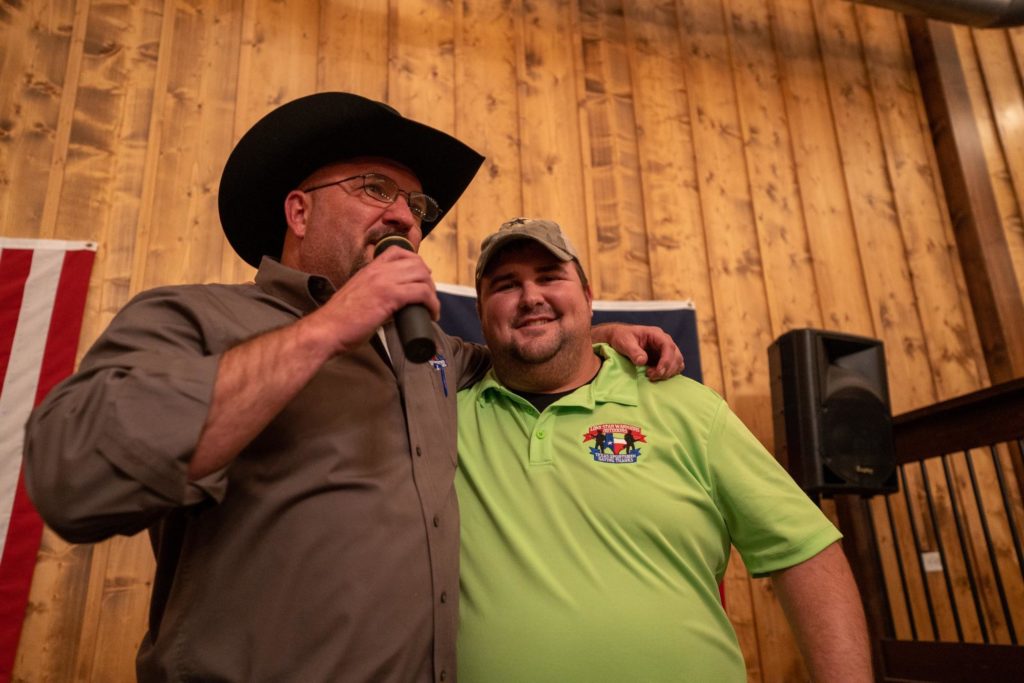 LSWO founder and president Chris Gill, left, introducing the guest speaker for the 2019 banquet, Ian Rook. Photo by Michael Herne/Coffee or Die.