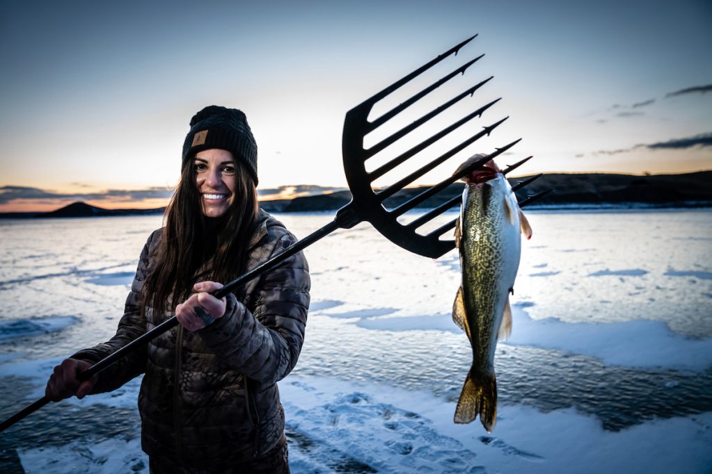 Laura Zerra with a walleye in South Dakota.
