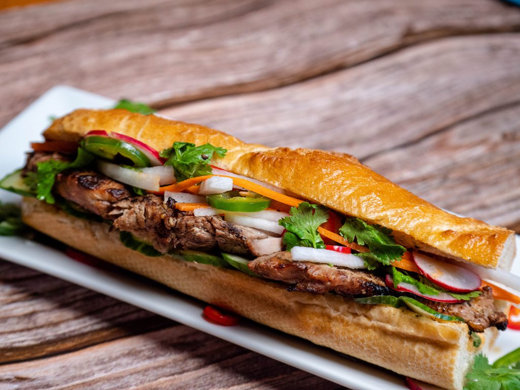 wild turkey bahn mi on a camp table