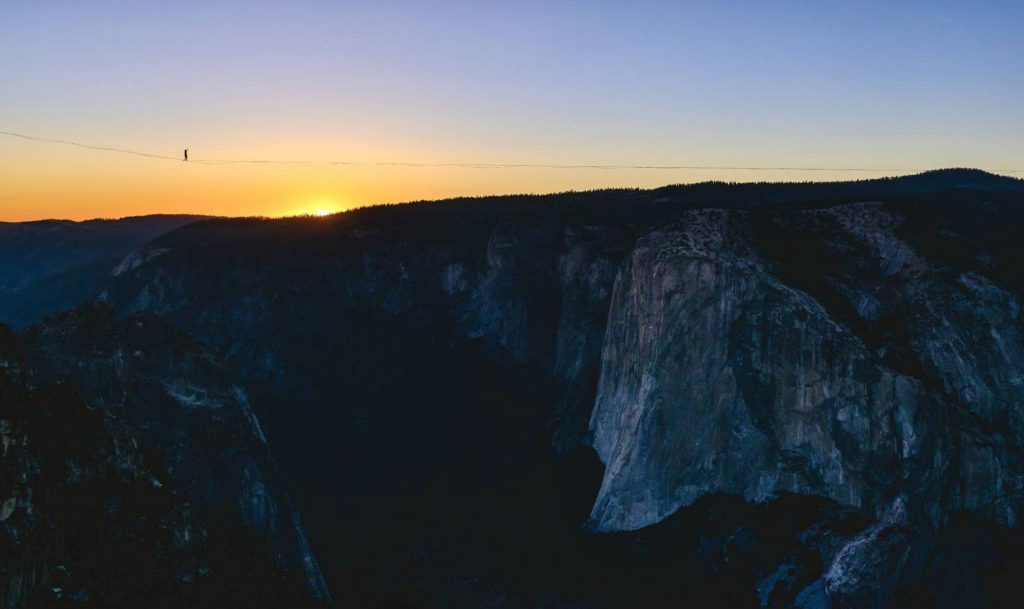 Daniel highlining sunset in Yosemite