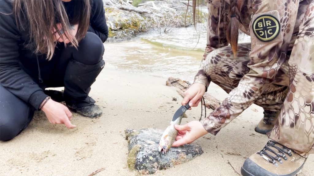 laura zerra teaches heather how to gut a small fish