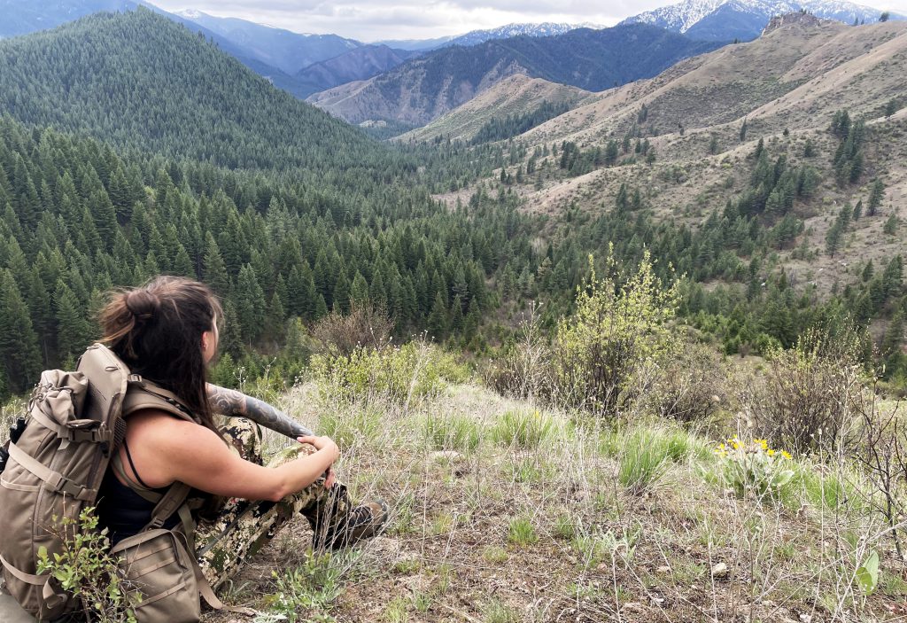 woman looking at mountains