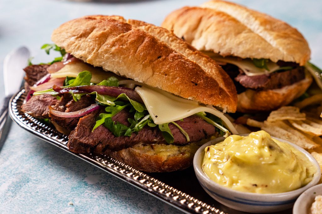 finished backstrap steak sandwich with extra aioli