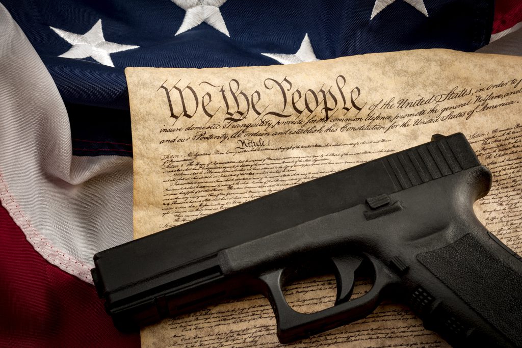 glock-like pistol with constitution and flag legal age for handgun purchases