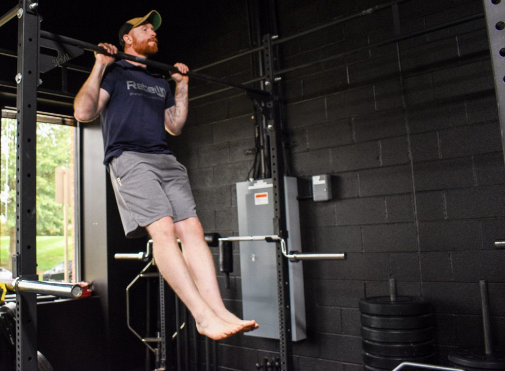 flexed arm hangs to help improve your pullups
