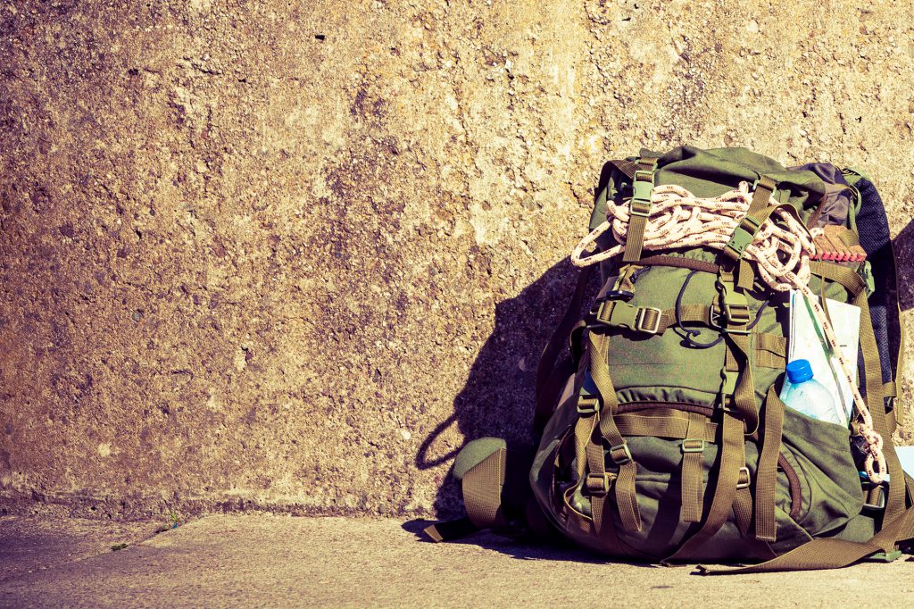 hiking pack against a wall