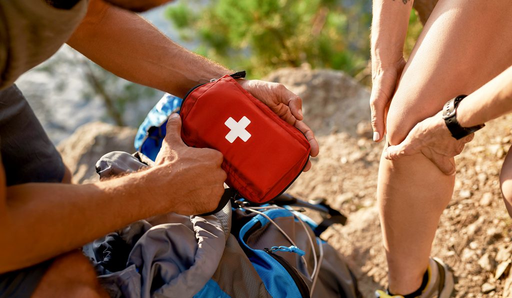 pack a first aid kit for an outdoor trip