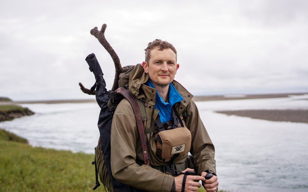 man packing out caribou bull alaska caribou hunt