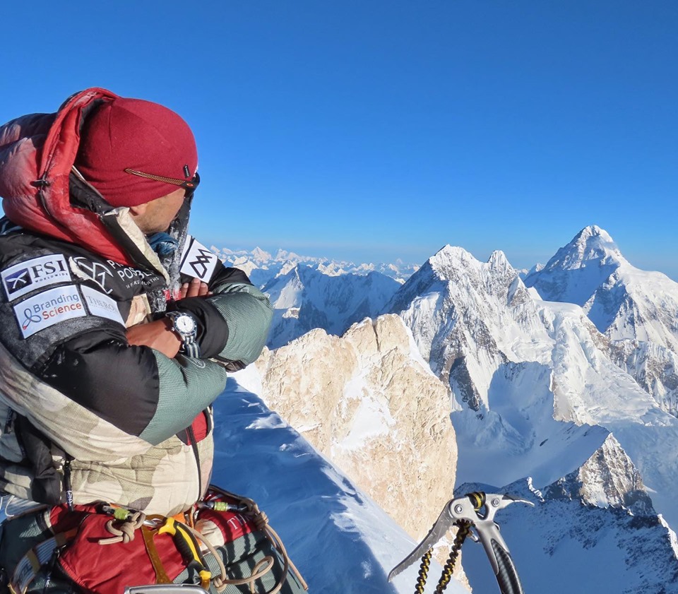 Purja looking at K2 mountian climbing