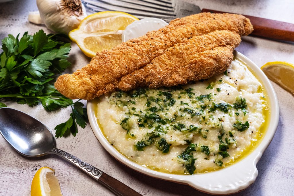 How To Make a Perfect Bowl of Creamy Grits and Crispy Fish