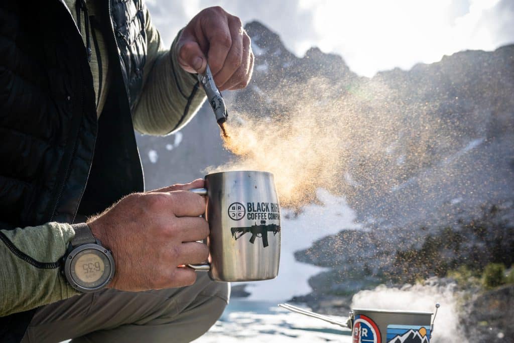 https://freerangeamerican.us/wp-content/uploads/2022/08/220710-whit-instant-sticks-keystone-hat-stainless-steel-mug-gsi-mesh-pourover-caf-yeti-arrowhead-nalgene-mountain-lake-56-1024x683.jpg