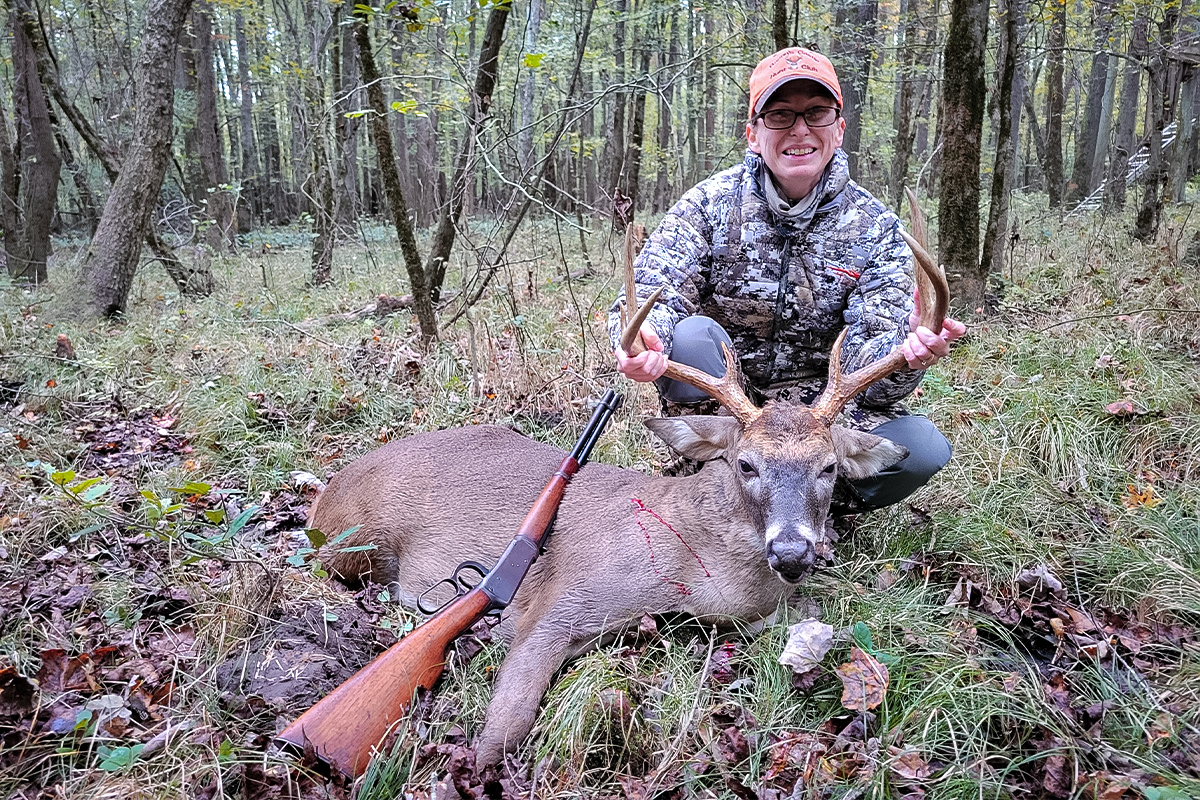 Alice Jones Webb posing with her buck