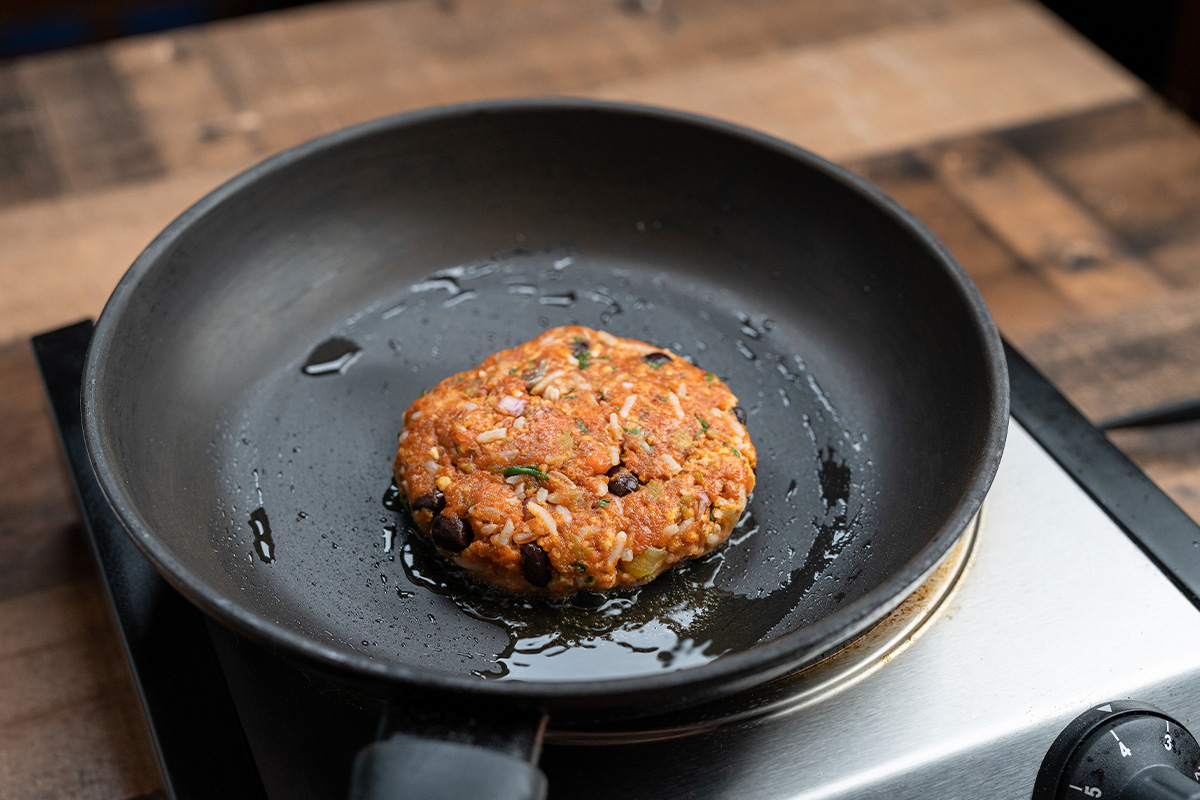 A light sear on both sides gives the burger texture and flavor.