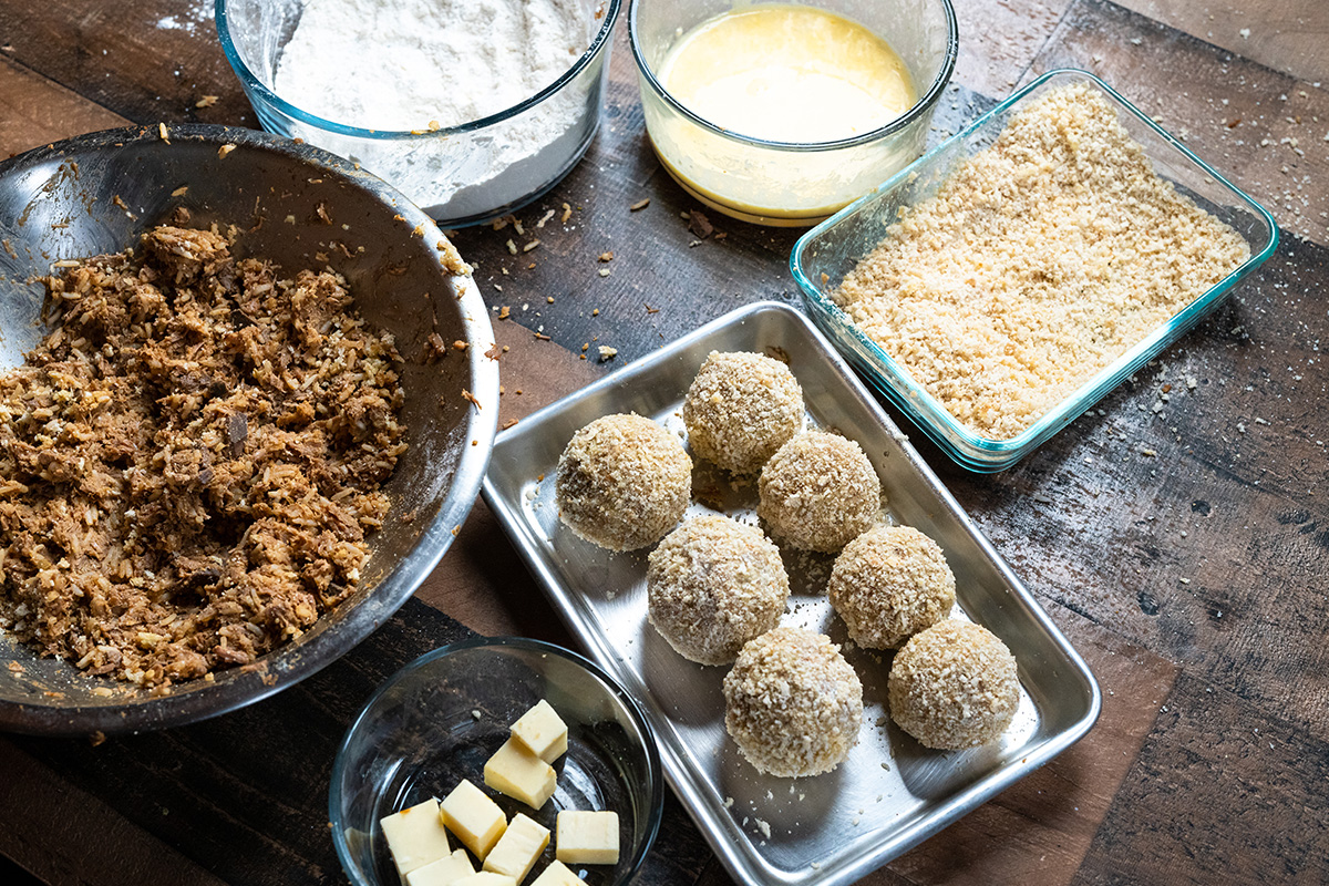 Make sure the boudin balls are firmly formed and fully breaded evenly so that they hold up to frying.