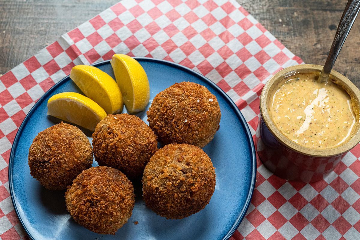 It doesn't get much better than a plate of fried boudin balls with a little cajun remoulade on the side.