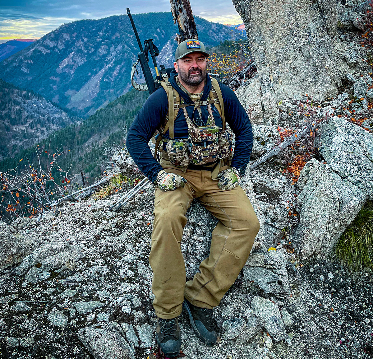 Tyr Symank rests on a rare patch of flat earth while the recon men search for a blood trail along a ridgeline in Idaho’s Bitterroots. Scrambling after lame buffalo, they climbed more than 2,000 feet in less than 90 minutes.
