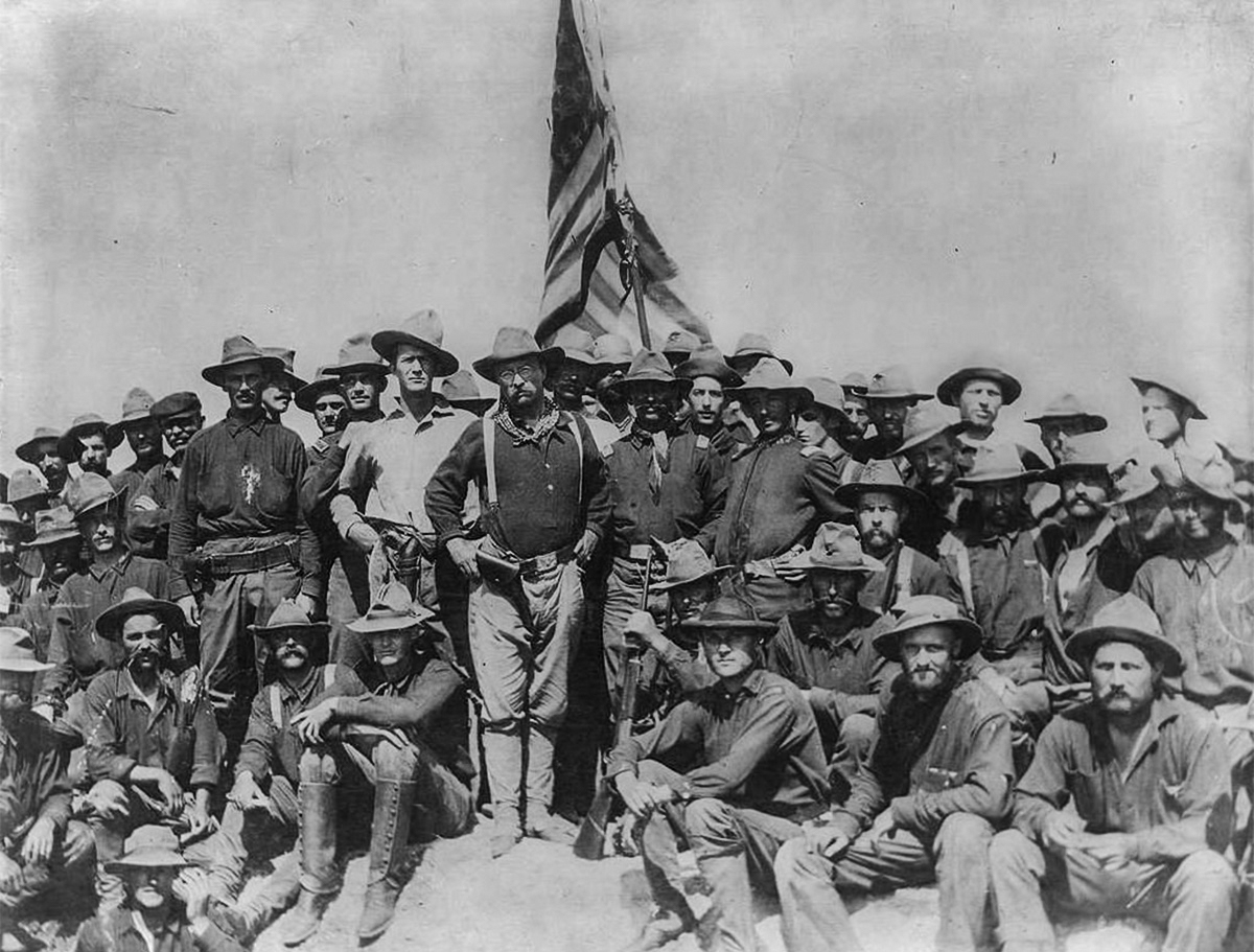 Colonel Theodore Roosevelt and the Rough Riders after capturing Kettle Hill in Cuba in July 1898.