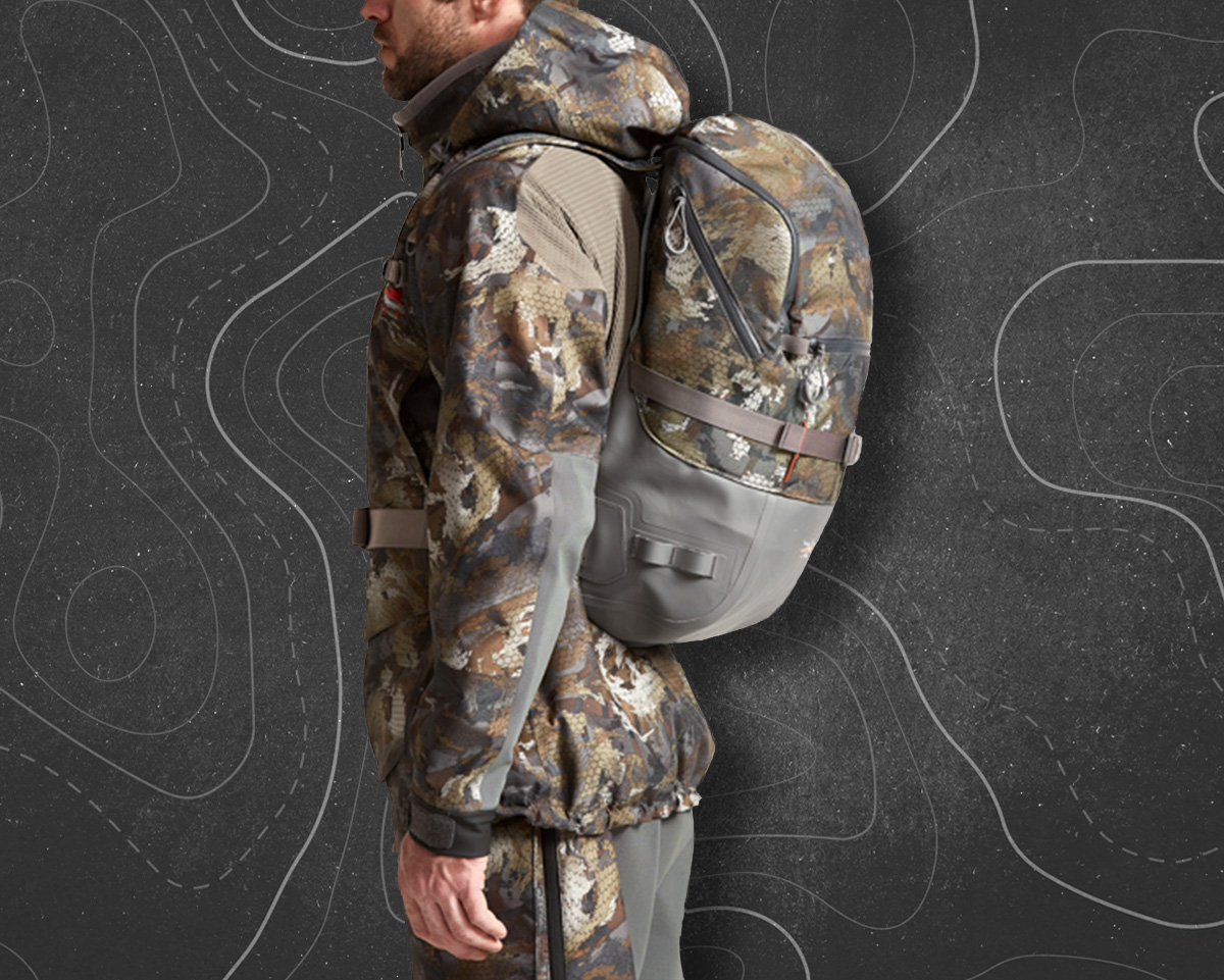 Sitka nailed the Timber Pack. It hangs to a tree, stores your gear, and holds your gun.