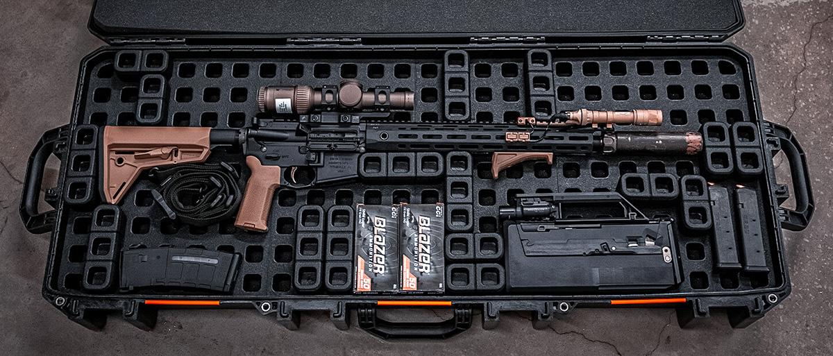 a nice layout with a rifle ammo and accessories