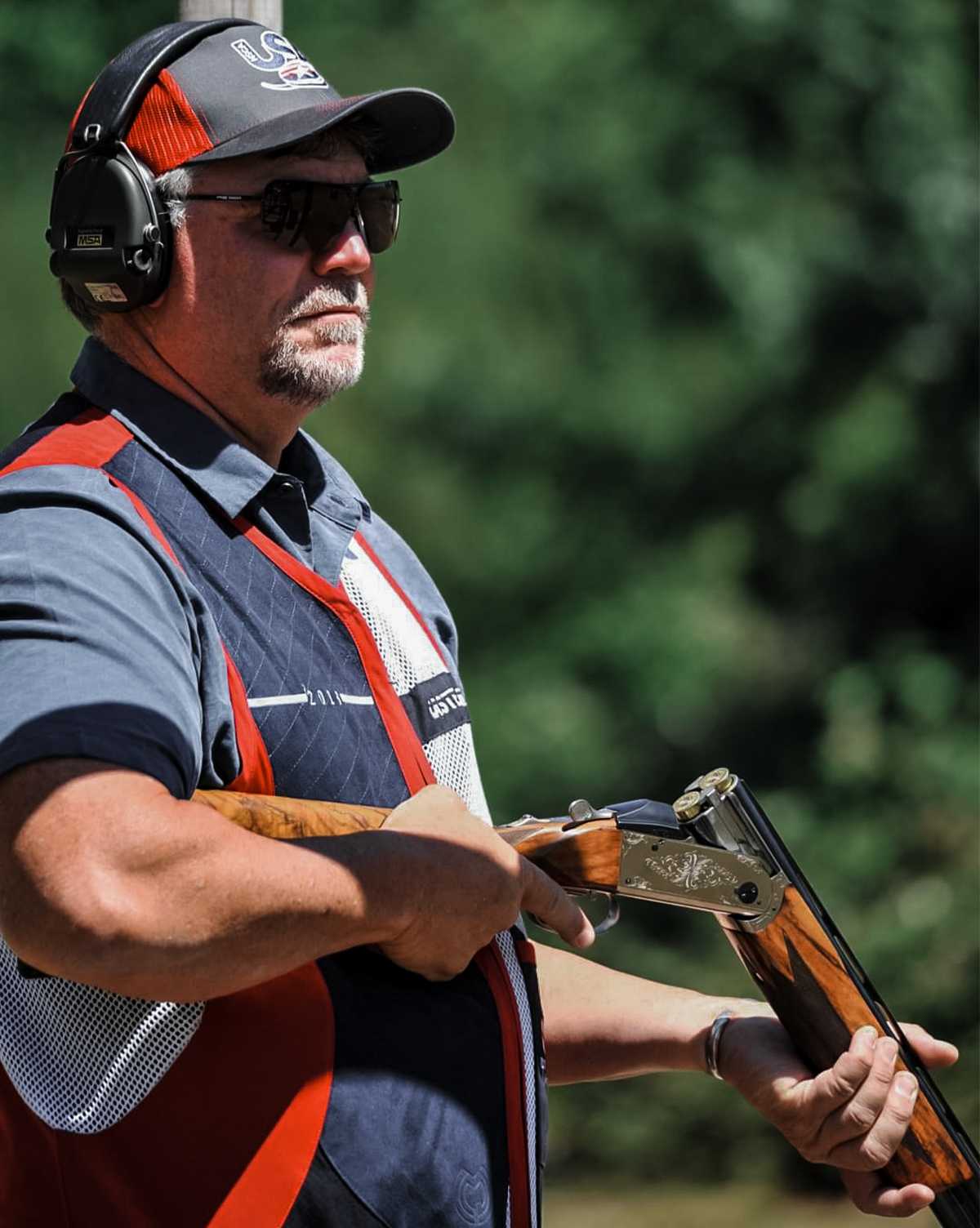 Three-time National Sporting Clays champion Andy Duffy shooting a German-made Krieghoff K-80. The K-80 is a direct descendent of Remington’s Model 32, a gun intended to compete with Browning’s Superposed, but introduced in the depths of the Great Depression.